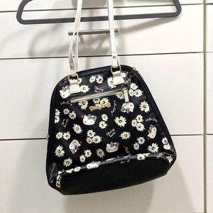 Hello Kitty convertible mini purse/backpack